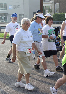 Sister Lucy Bonifas, OSF, a member of Team Lourdes, crosses the starting line at the Fund Run for Charities in Paducah in 2005. File photo. 