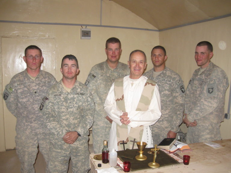 Willett, Rev David William Army pic in tent with soldiers at Mass